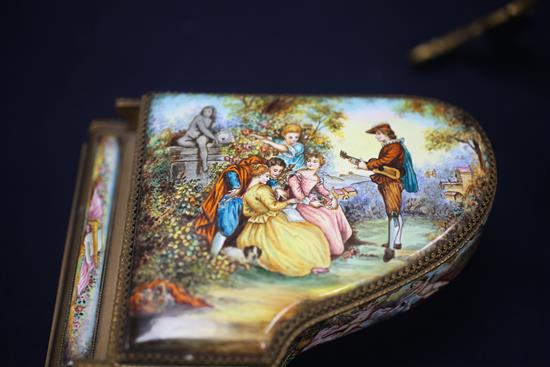 Two 20th century Viennese enamel musical boxes, in the form of a piano and a cello with stand, 6.5in. & 11.5in.